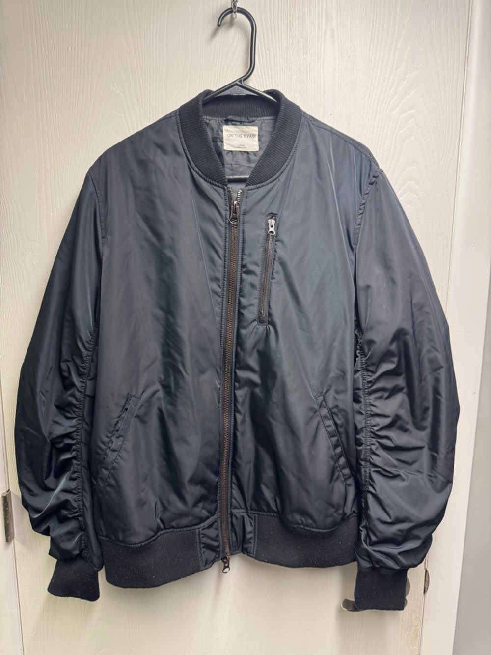 on the byas Navy Blue Bomber Jacket